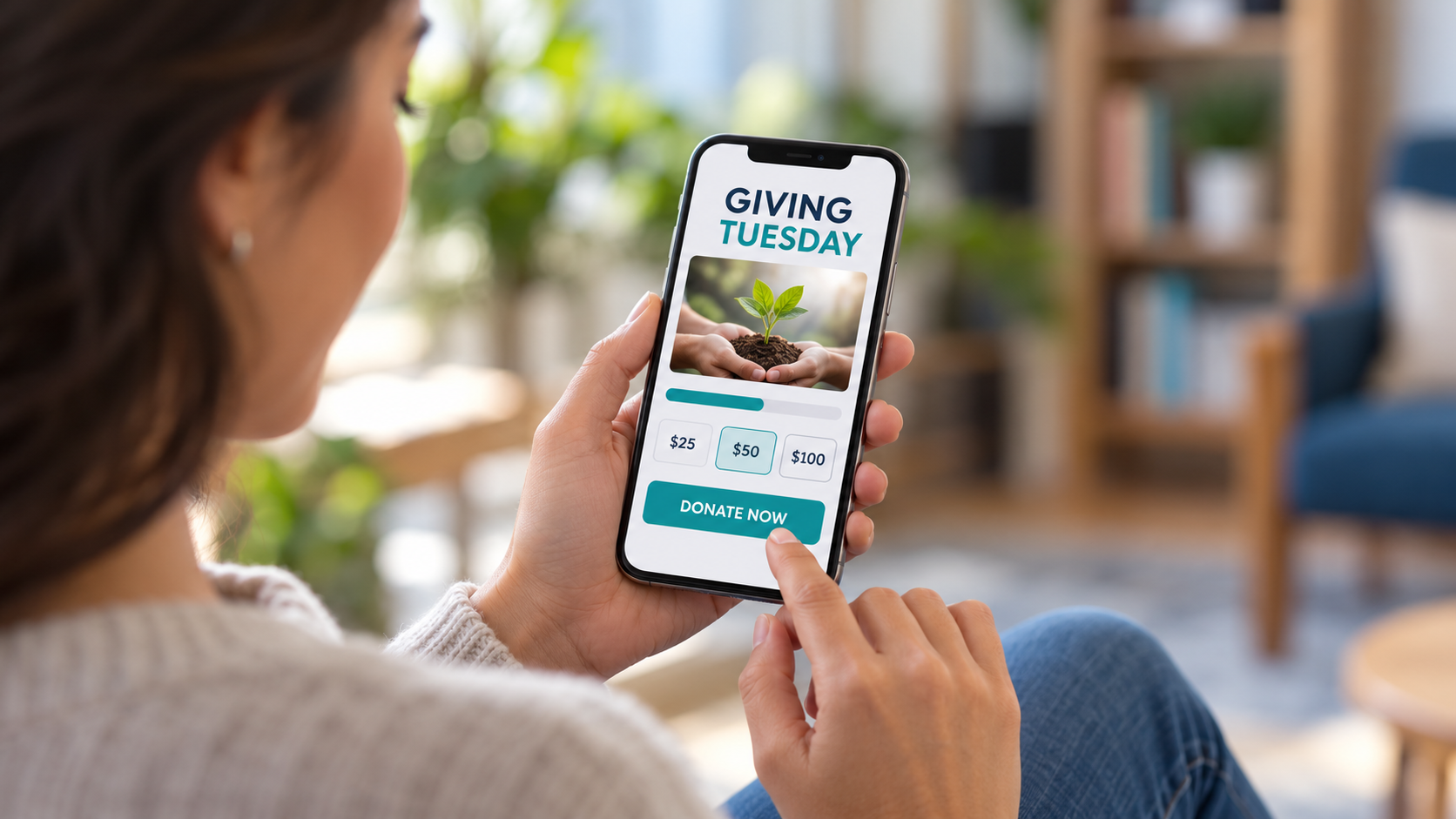 Person viewing a Giving Tuesday donation page on a smartphone.